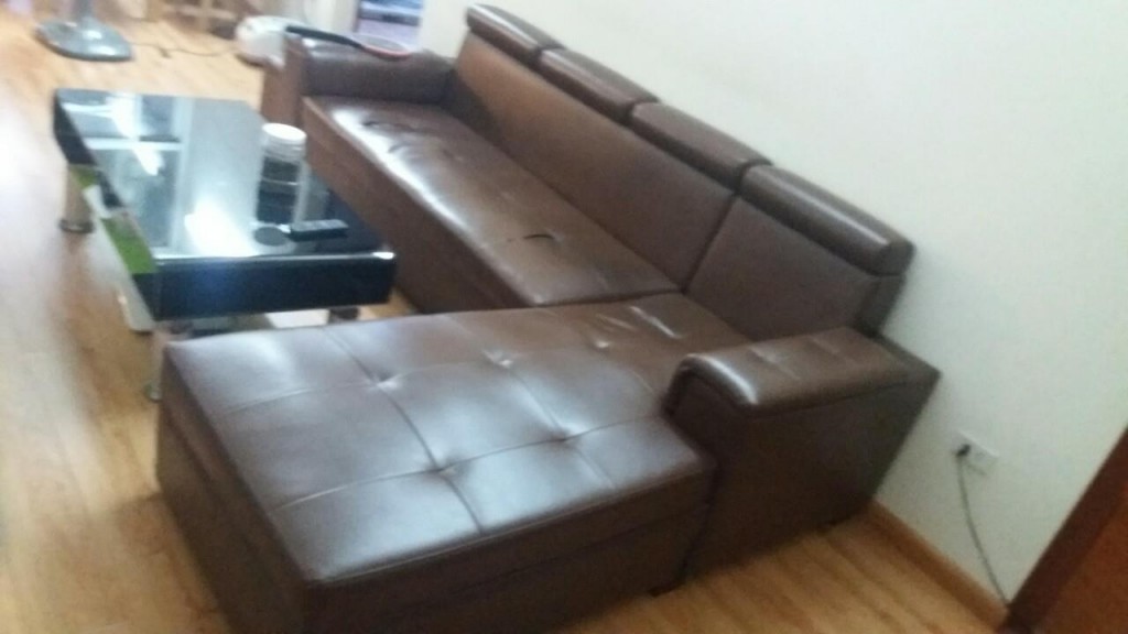 Bộ ghế sofa da đã bị rách phần mặt ghế chia ô