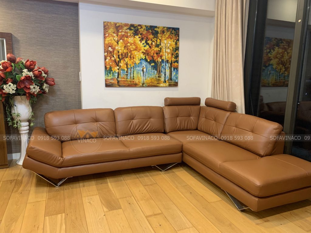 Bộ ghế sofa sau khi được thay bỏ lớp vỏ bọc cũ bong tróc/nổ da sang một lớp vỏ da nano màu da bò rất phù hợp với không gian phòng khách của gia đình khách hàng